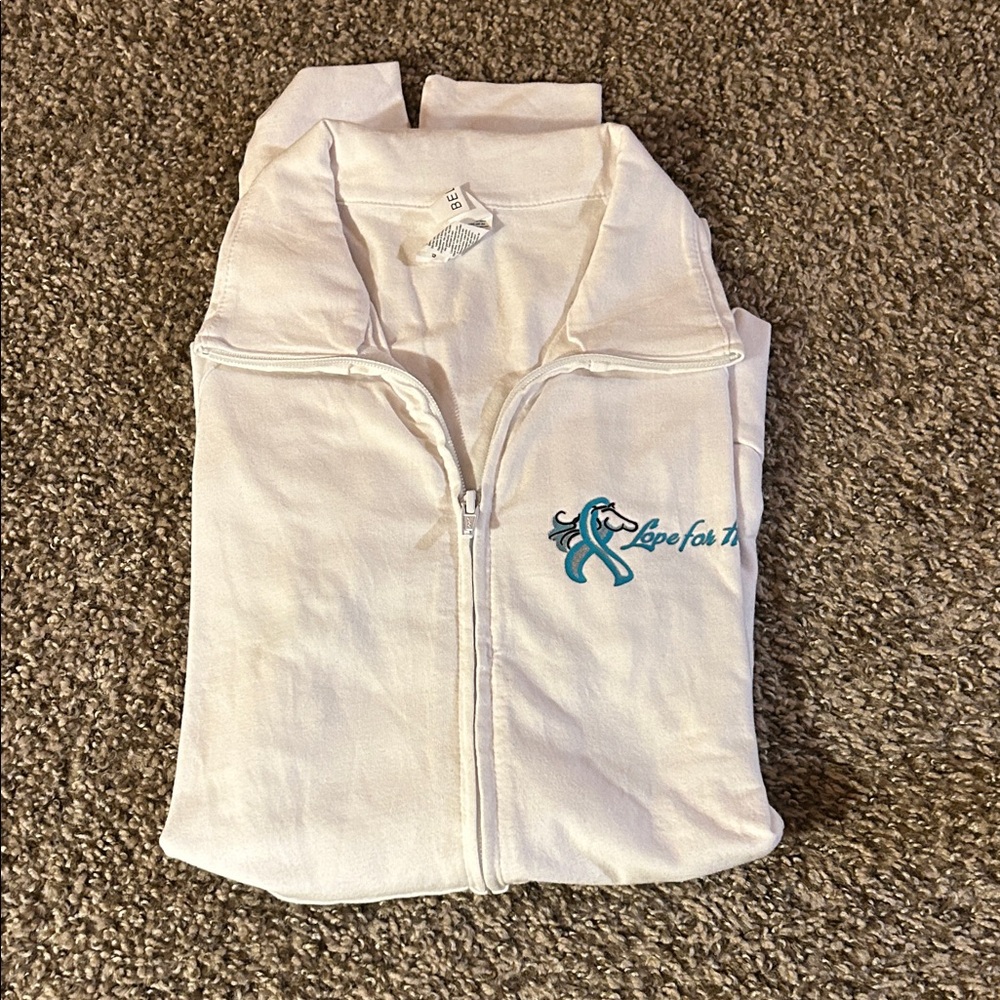 White zip- up jacket.